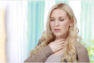 Woman having allergy reaction